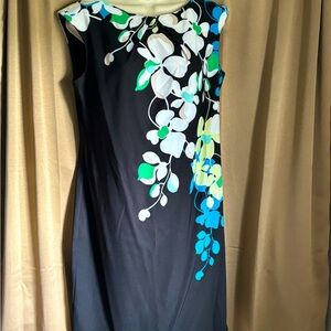 Work or going out cocktail dress. 2 pleats at top knee length, hidden zipper